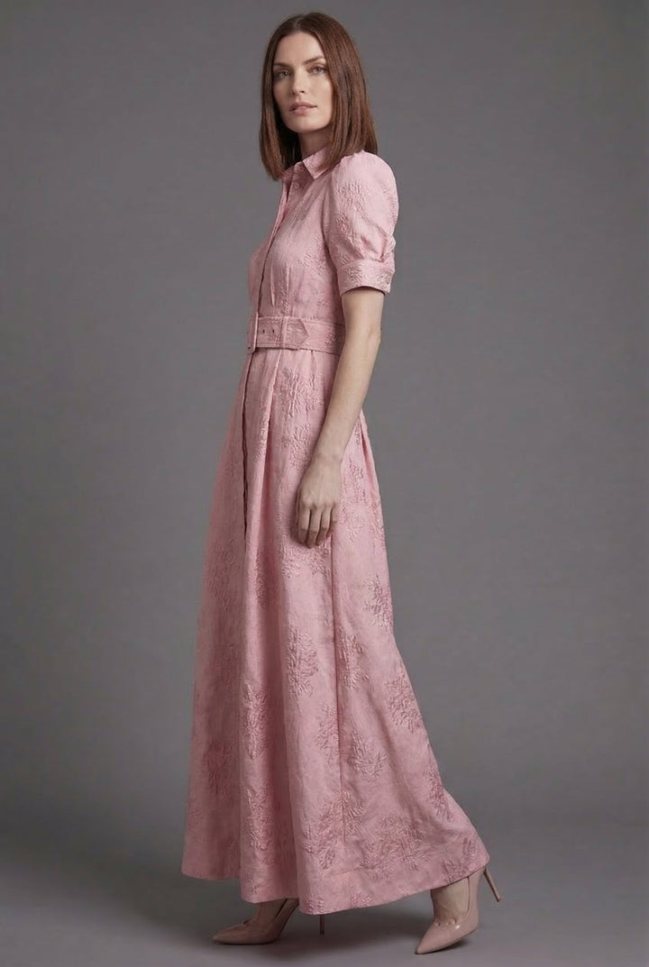 Women's full skirt maxi dress with chic puff sleeves & a flattering belt. Ideal for elegant evening wear.