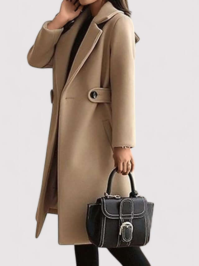 Warm brown ladies' belted winter jacket, an elegant and flattering piece of outerwear for stylish women.