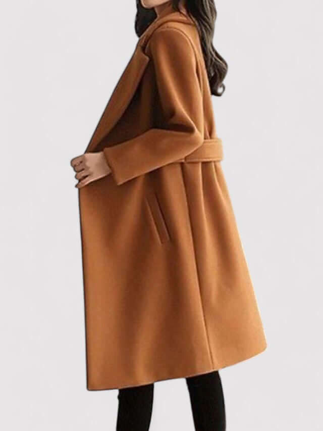 Flattering belted women's winter coat, accentuating the waist for an elegant silhouette and warm comfort.