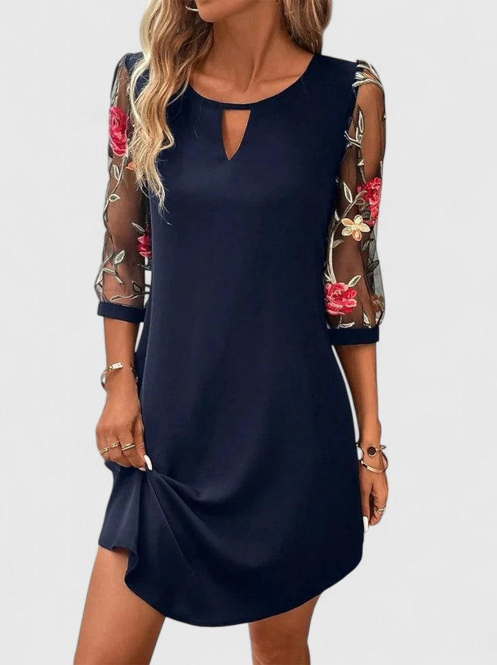 Elegant women's black midi dress, perfect for summer special occasions & parties. Chic formal wear.