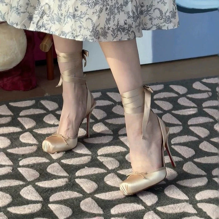 Smooth material women's platform court shoes, with a sophisticated ankle strap, ideal formal footwear for weddings.