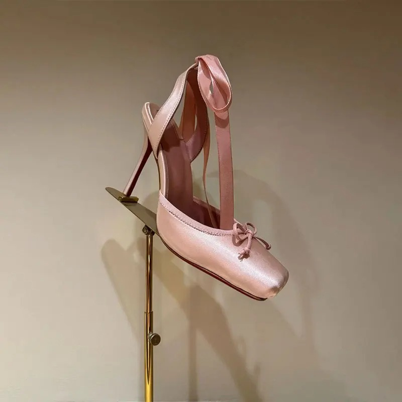 High platform court shoes for women, offering extra height & stability, with a chic ankle strap & high heel.
