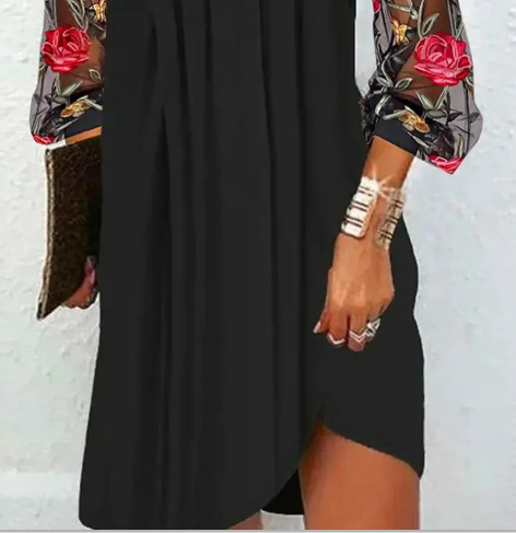 Black women's party dress featuring a V-neckline and elegant sheer floral sleeves, ideal for evening wear.