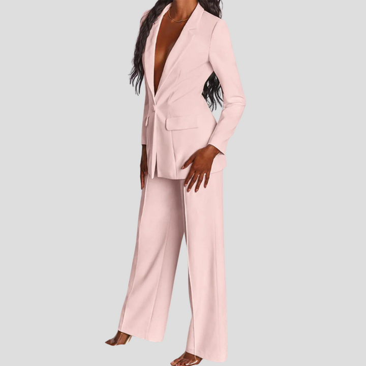 Elegant two-piece women's suit: professional blazer and trouser set for versatile office wear.