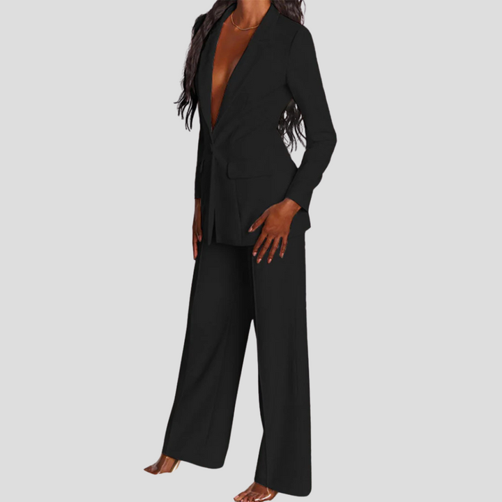 Women's elegant blazer and trouser suit set for a polished, professional office wear style.