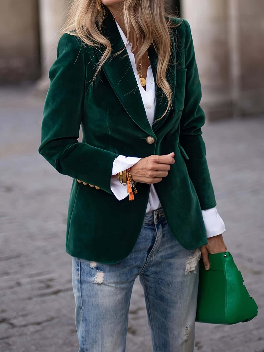 Stylish single-breasted women's blazer, tailored for elegant office wear or casual chic looks.