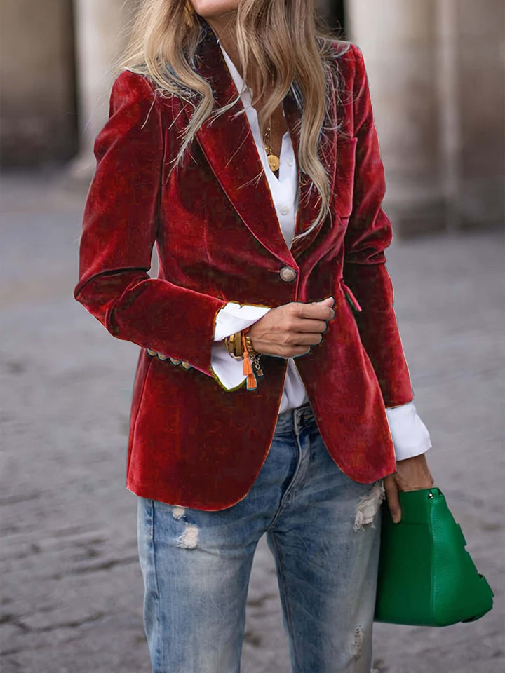 Modern tailored women's blazer with elegant gold buttons, perfect for a chic and versatile wardrobe.