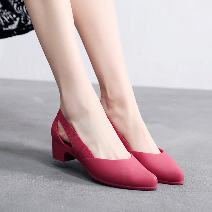 Fashionable women's block heel pumps with unique cutout details. Elegant pointed toe slip-on shoes for sophisticated style.