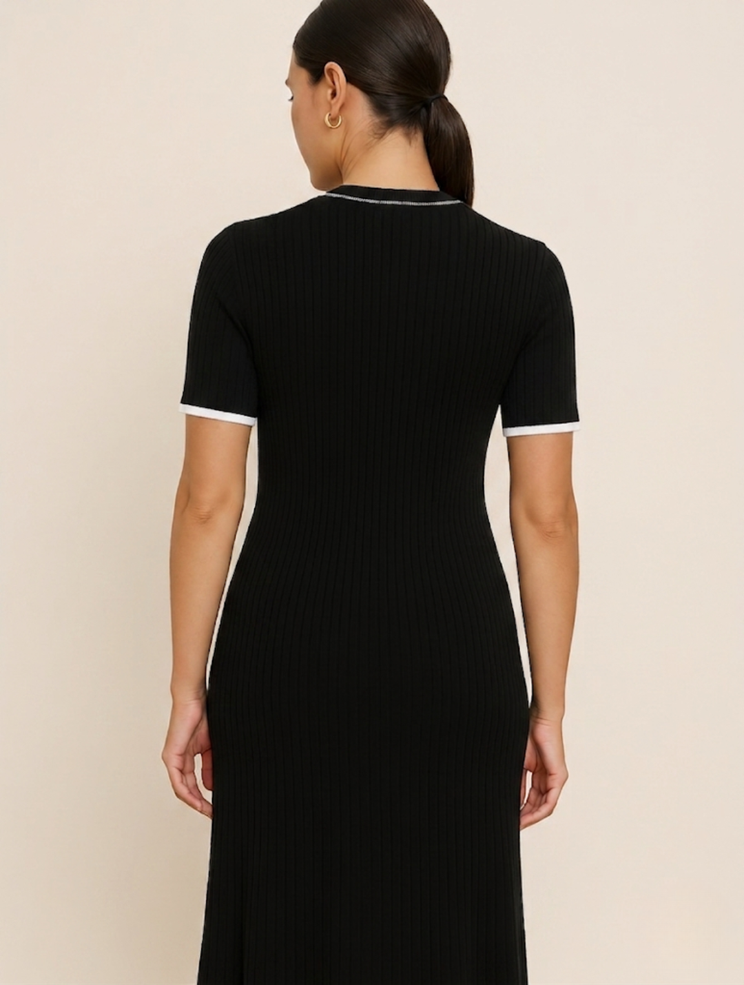 White bodycon maxi dress for women, offering a sleek, flattering & comfortable fit for formal wear.