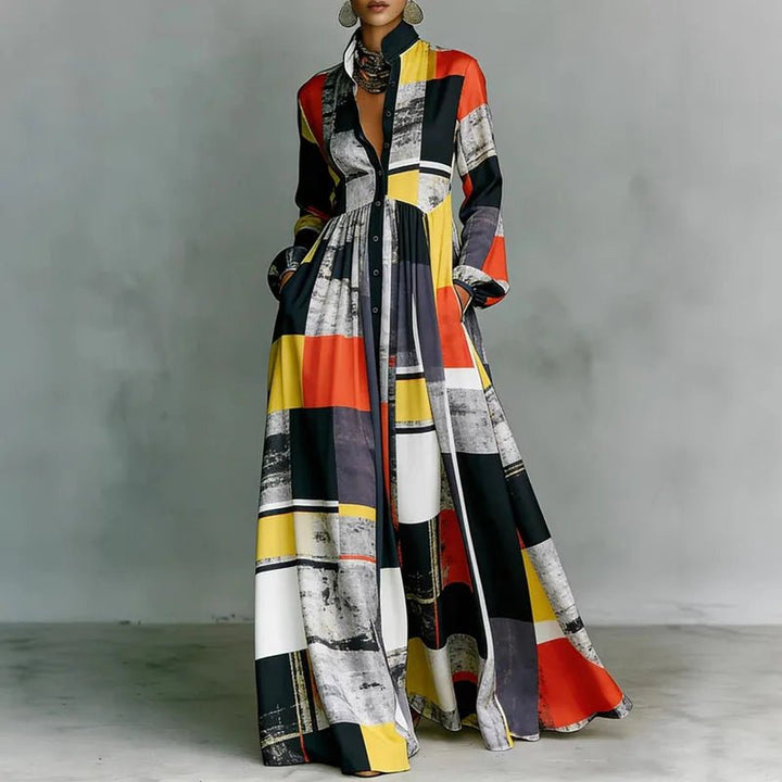 Close-up of the geometric print on a women's high-waist bohemian maxi dress with elegant button details.
