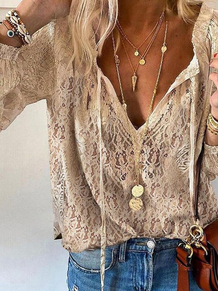 Elegant women's boho blouse with a stylish cutout neckline, perfect for spring & summer fashion.