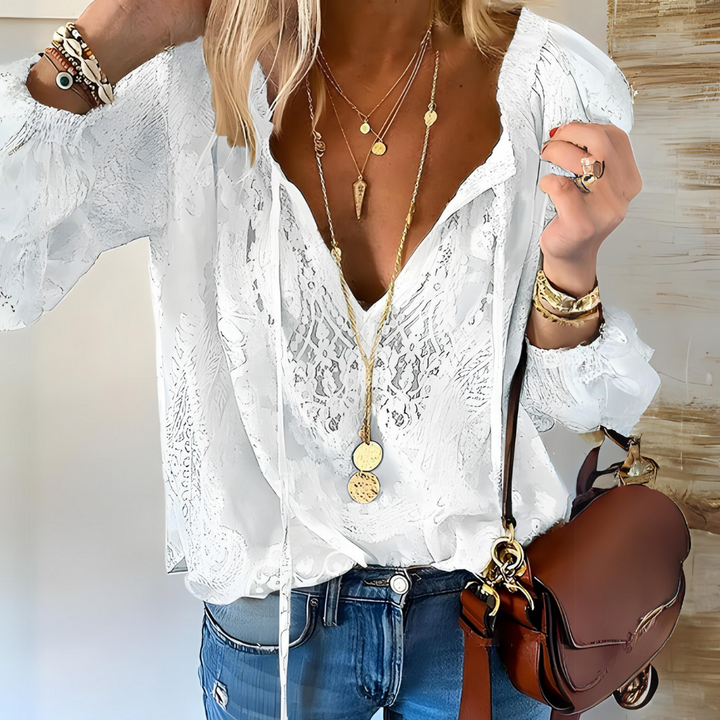Chic women's flowy boho blouse, comfortable long sleeve top with an elegant cutout neckline.