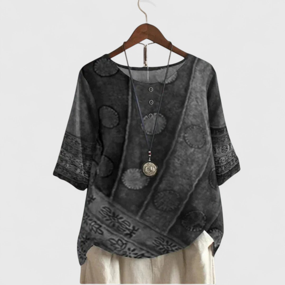 Unique bohemian style women's top with vibrant patchwork print. Long sleeve and relaxed fit, ideal for travel or daily wear.