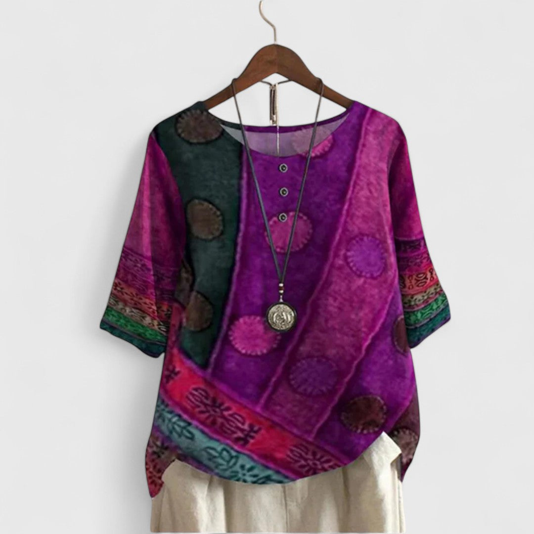 Stylish women's patchwork print top with a bohemian long sleeve design. Elegant yet casual, perfect for versatile everyday styling.