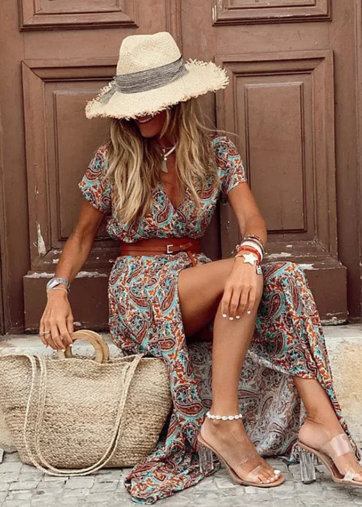 Stylish women's short sleeve boho printed maxi dress, featuring a flattering silhouette for summer parties & resort wear.