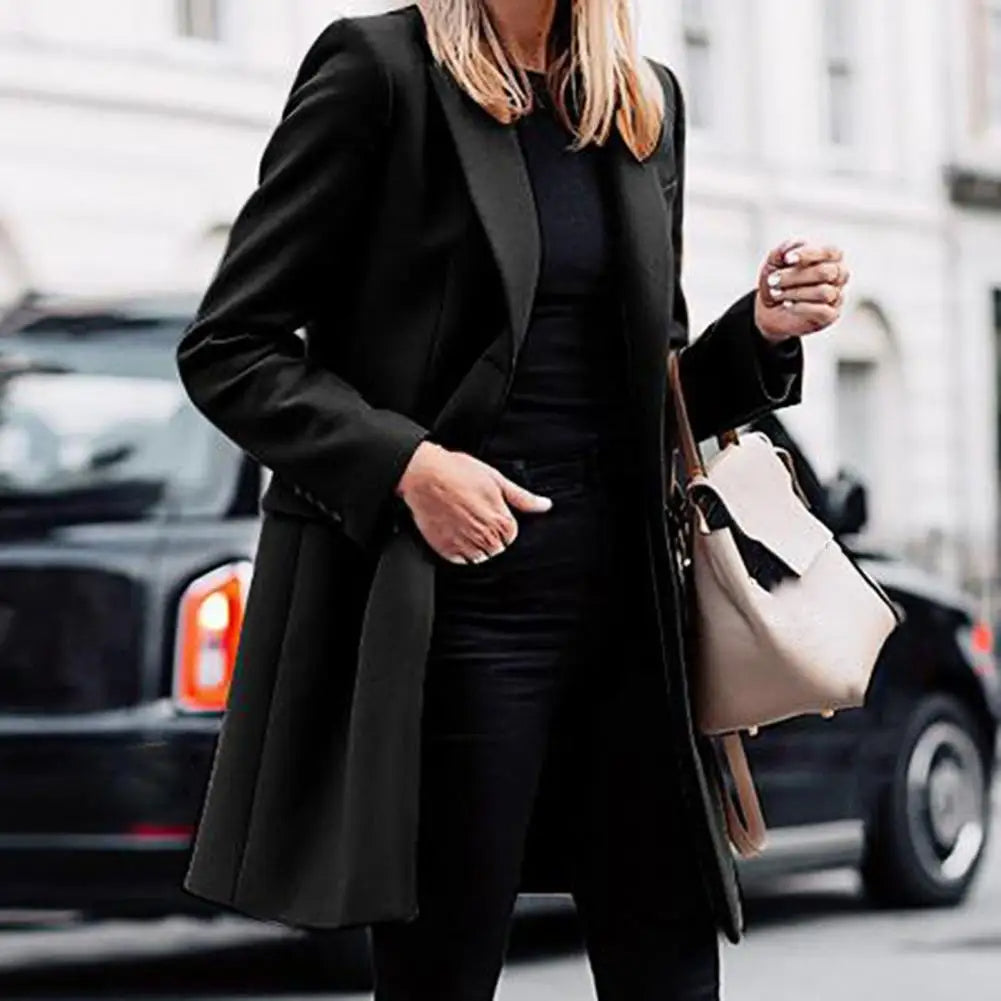 New women's elegant boho trench coat. Long winter outerwear, a cozy fashion trench for fall style.