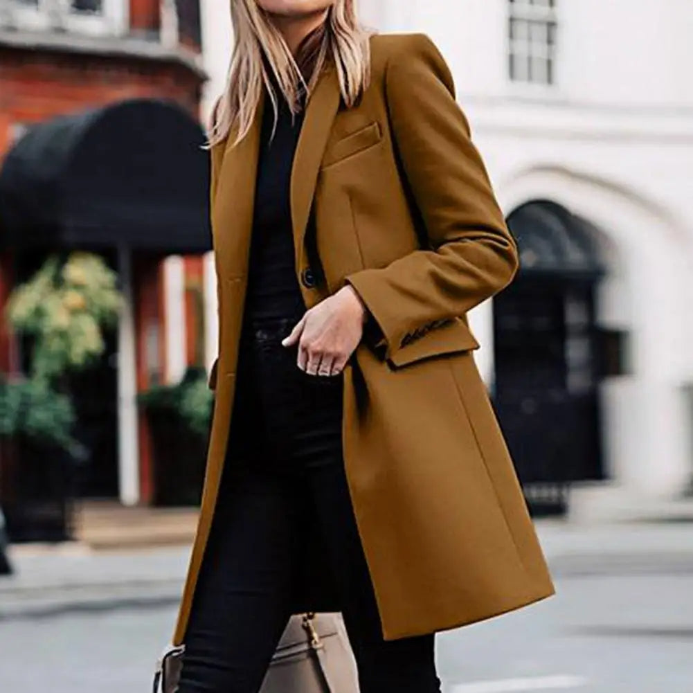 Fashionable women's long trench coat, offering cozy warmth in elegant boho style. Perfect winter outerwear.