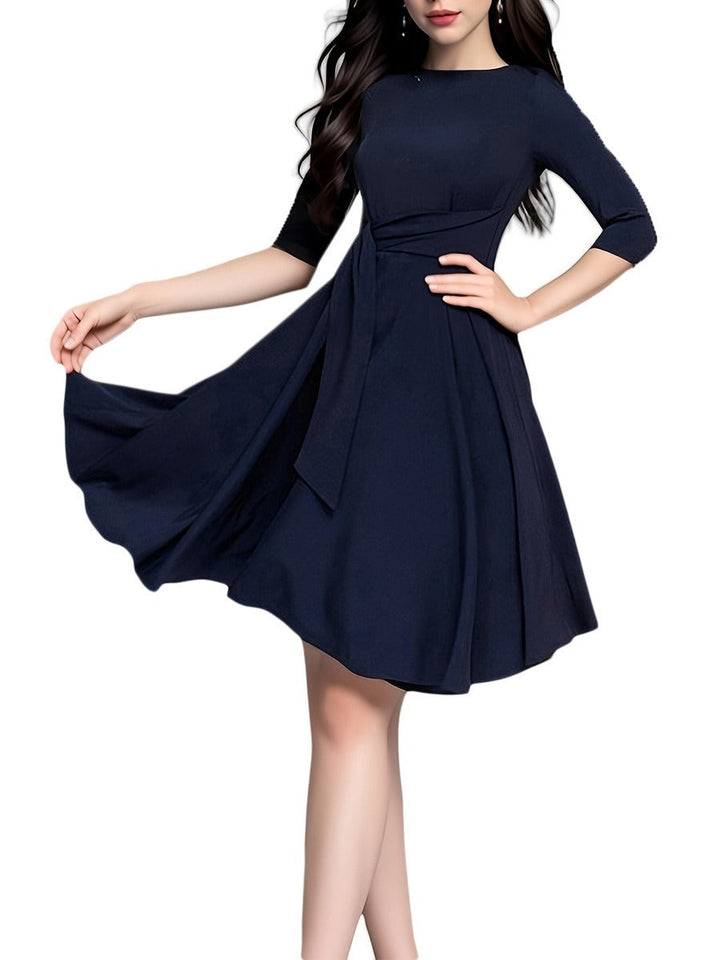 Elegant women's bow midi blouse, perfect for work or party. Chic 3/4 sleeve top with sophisticated tie waist.