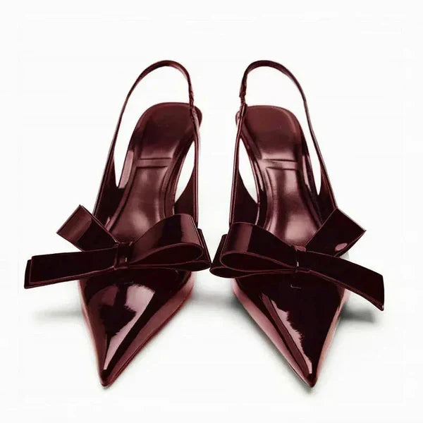 Elegant women's bow slingback pointed toe heels with stiletto, perfect for formal and evening wear.