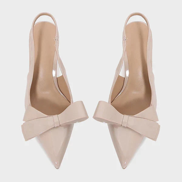Women's bow slingback pointed toe stiletto heels. Elegant and fashionable formal evening shoes.