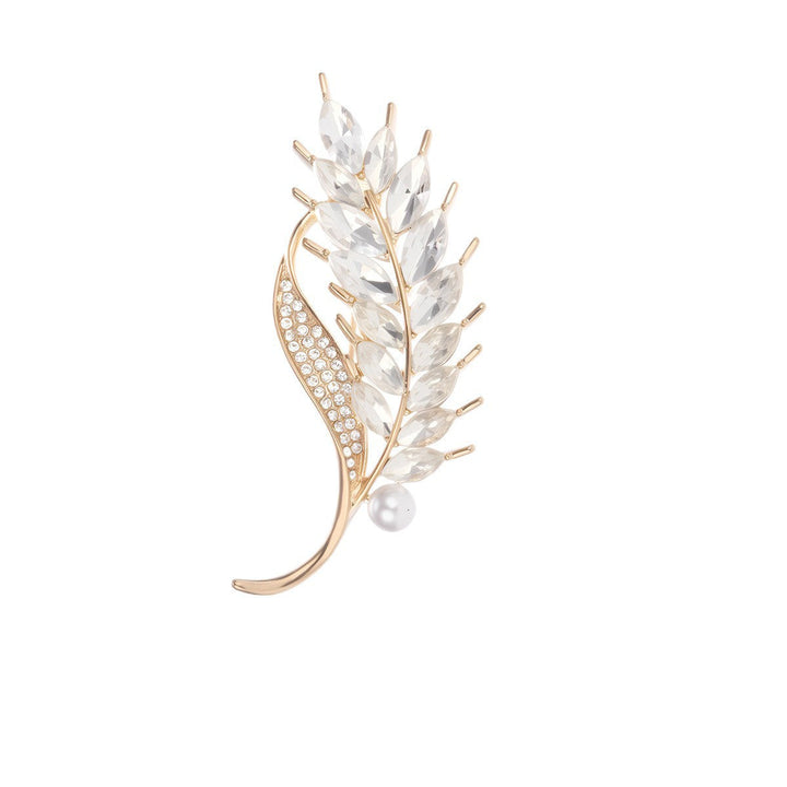Stylish women's glitter stone & pearl brooch pin, a sophisticated fashion accessory.