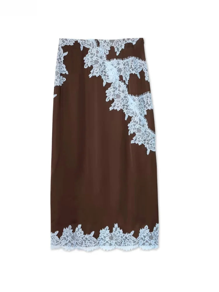 Sophisticated brown women's outfit: V-neck halter top and a long maxi skirt with beautiful lace details.