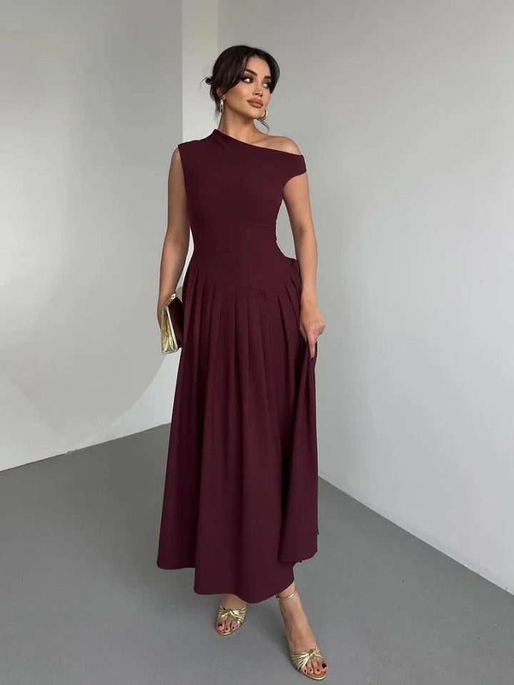 Elegant women's burgundy draped one-shoulder maxi dress, perfect for formal events & evening wear.