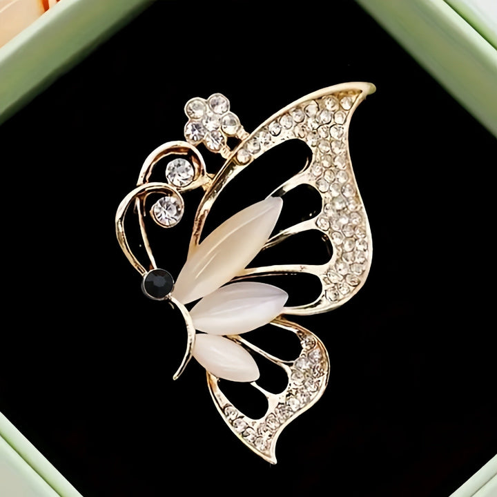 Dazzling rhinestone butterfly pin, a sophisticated women's jewelry brooch for elegant outfits.