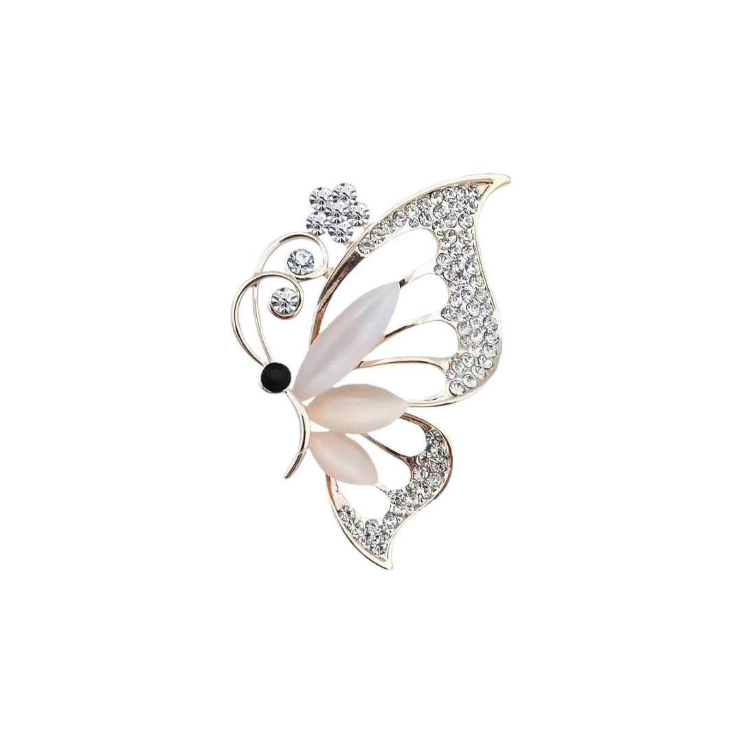 Intricate butterfly design brooch for women, adorned with brilliant rhinestones, a chic jewelry pin.