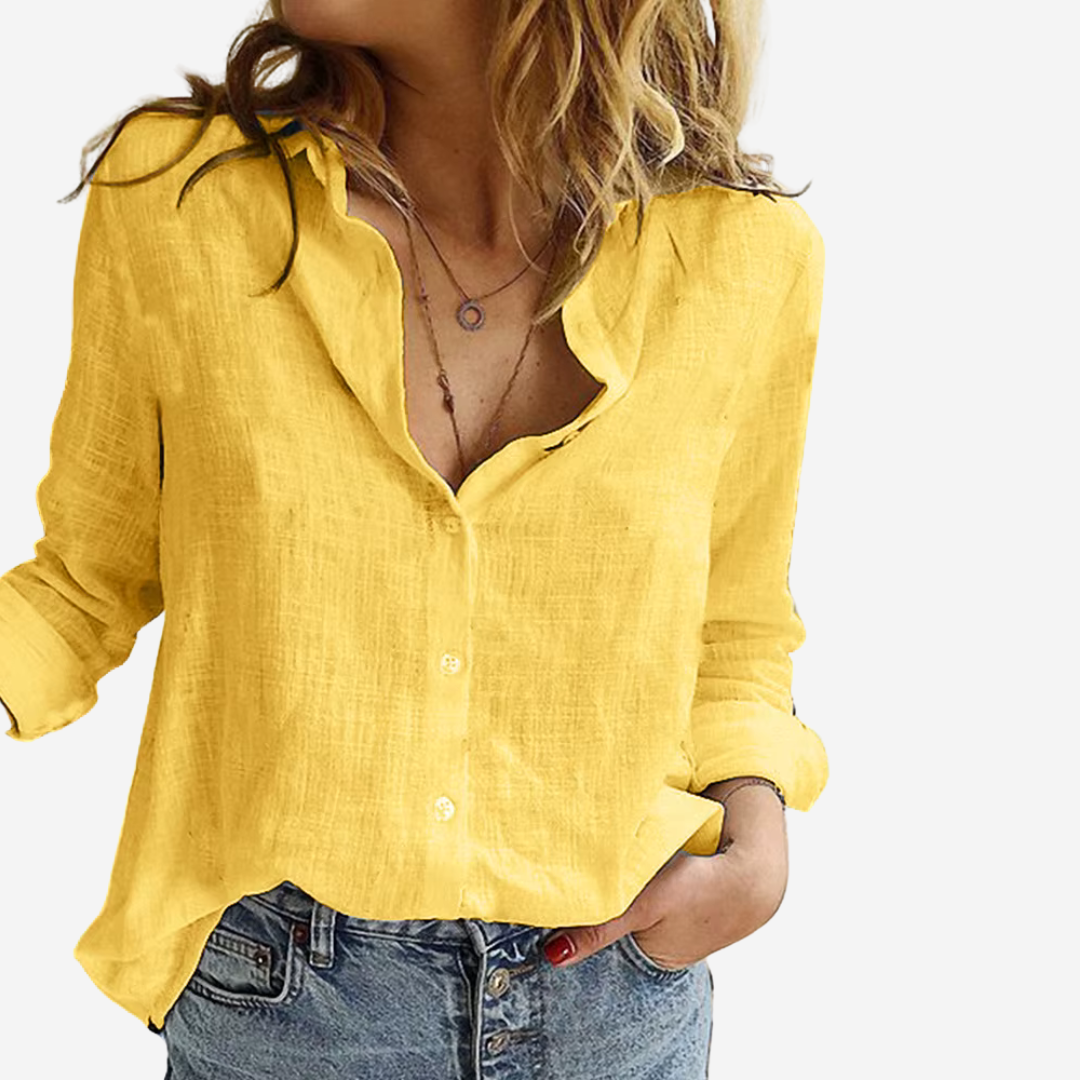 Stylish women's long-sleeve button-down blouse, relaxed fit, perfect for spring fashion & versatile outfits.
