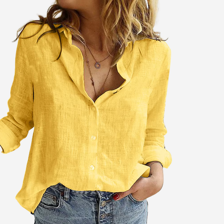 Stylish women's long-sleeve button-down blouse, relaxed fit, perfect for spring fashion & versatile outfits.
