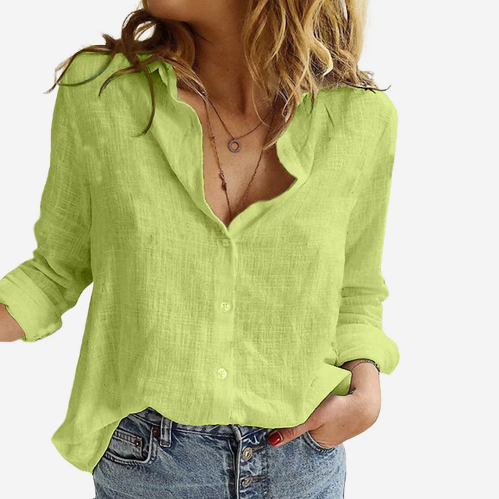 Comfortable & chic women's button-down blouse. Relaxed long-sleeve top, ideal for elegant daily or office wear.
