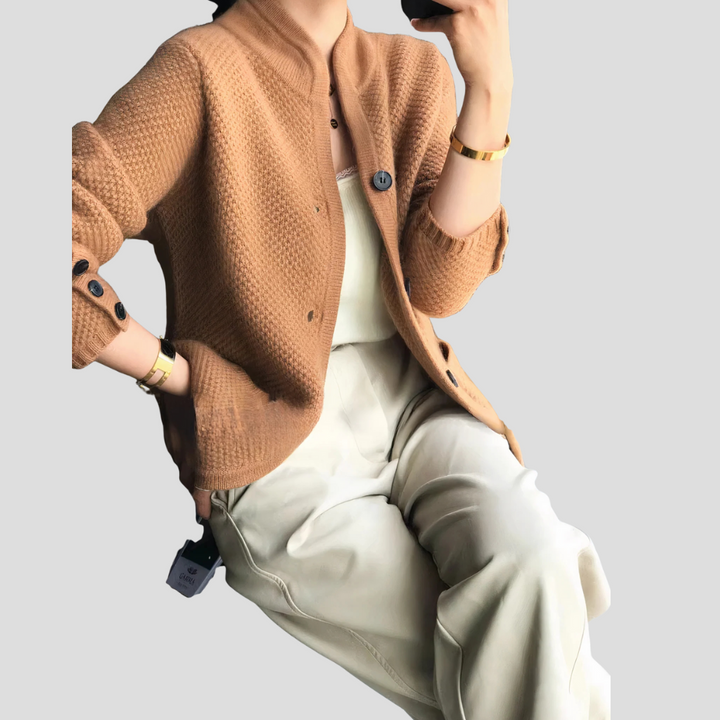 Stylish women's long sleeve button-front cardigan, showcasing its elegant design and soft knit texture.