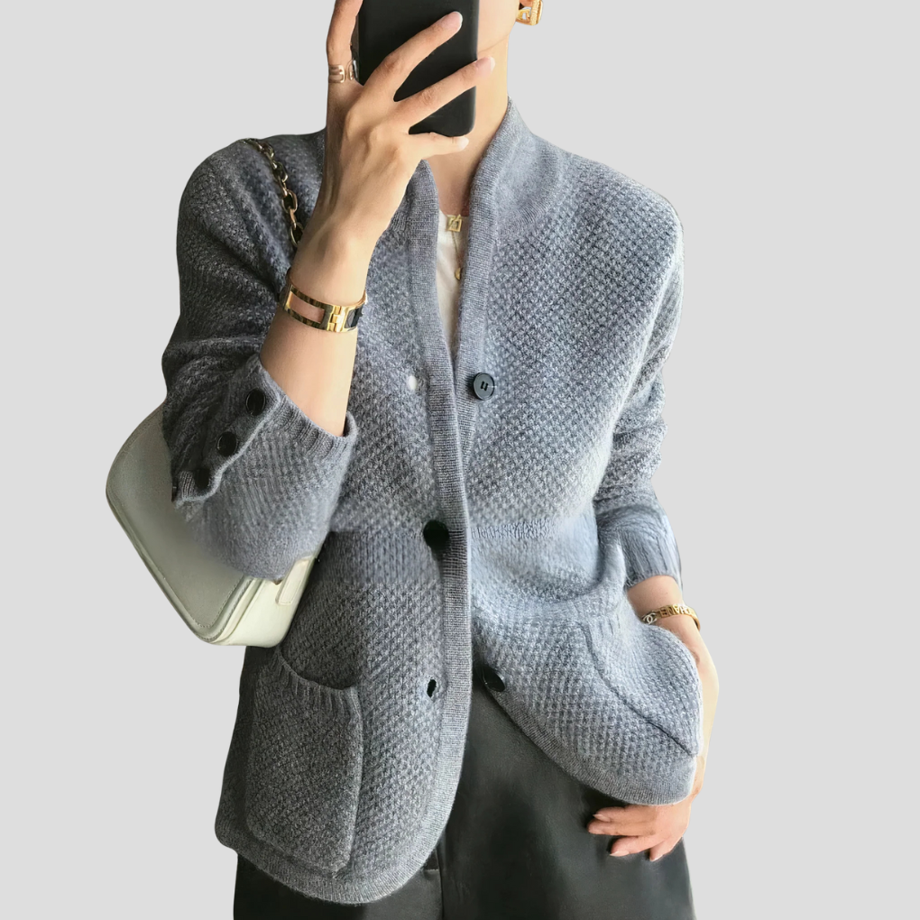 Neutral-toned women's button-front cardigan, an essential piece for layering and timeless women's fashion.