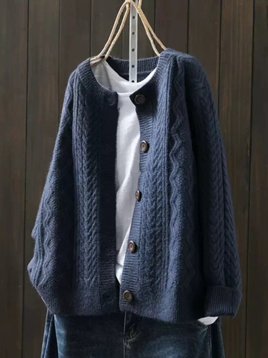 Stylish women's cable-knit button-down cardigan, perfect for cozy and chic everyday wear.