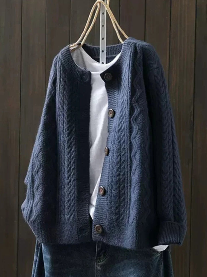 Stylish women's cable-knit button-down cardigan, perfect for cozy and chic everyday wear.