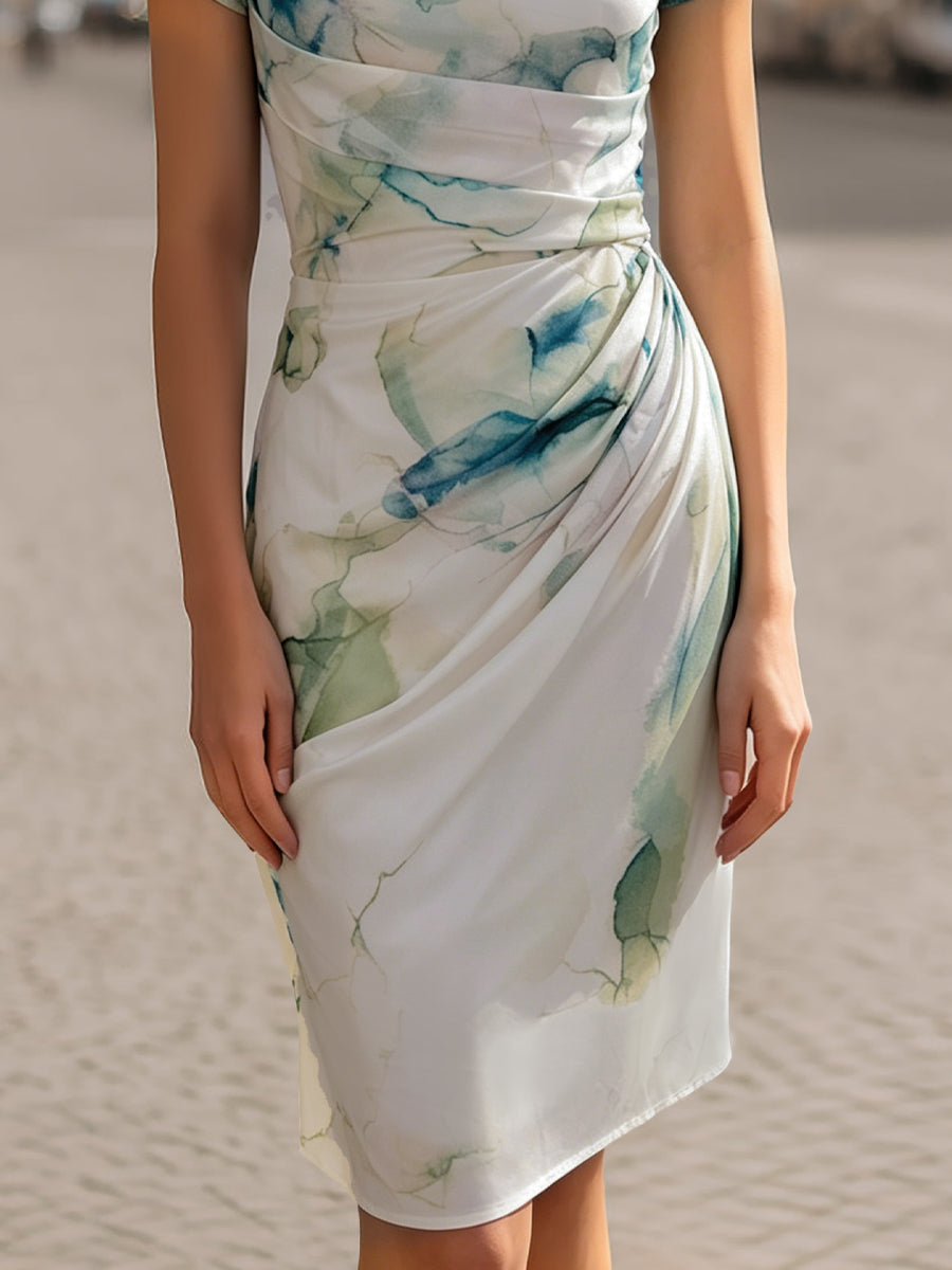 Stylish women's cap sleeve sheath dress featuring a cowl neckline & elegant ruched design.