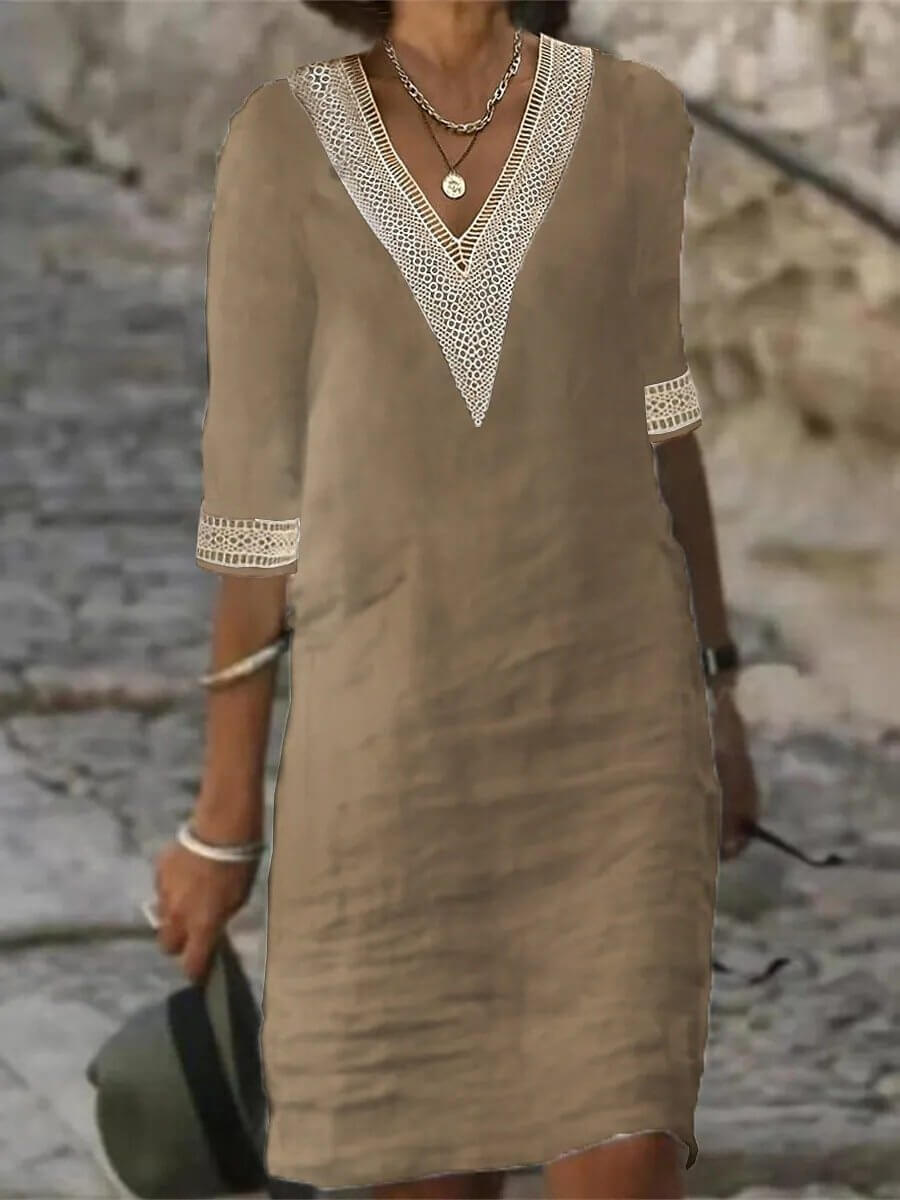 Relaxed fit women's summer V-neck dress, perfect for comfort & effortless style.
