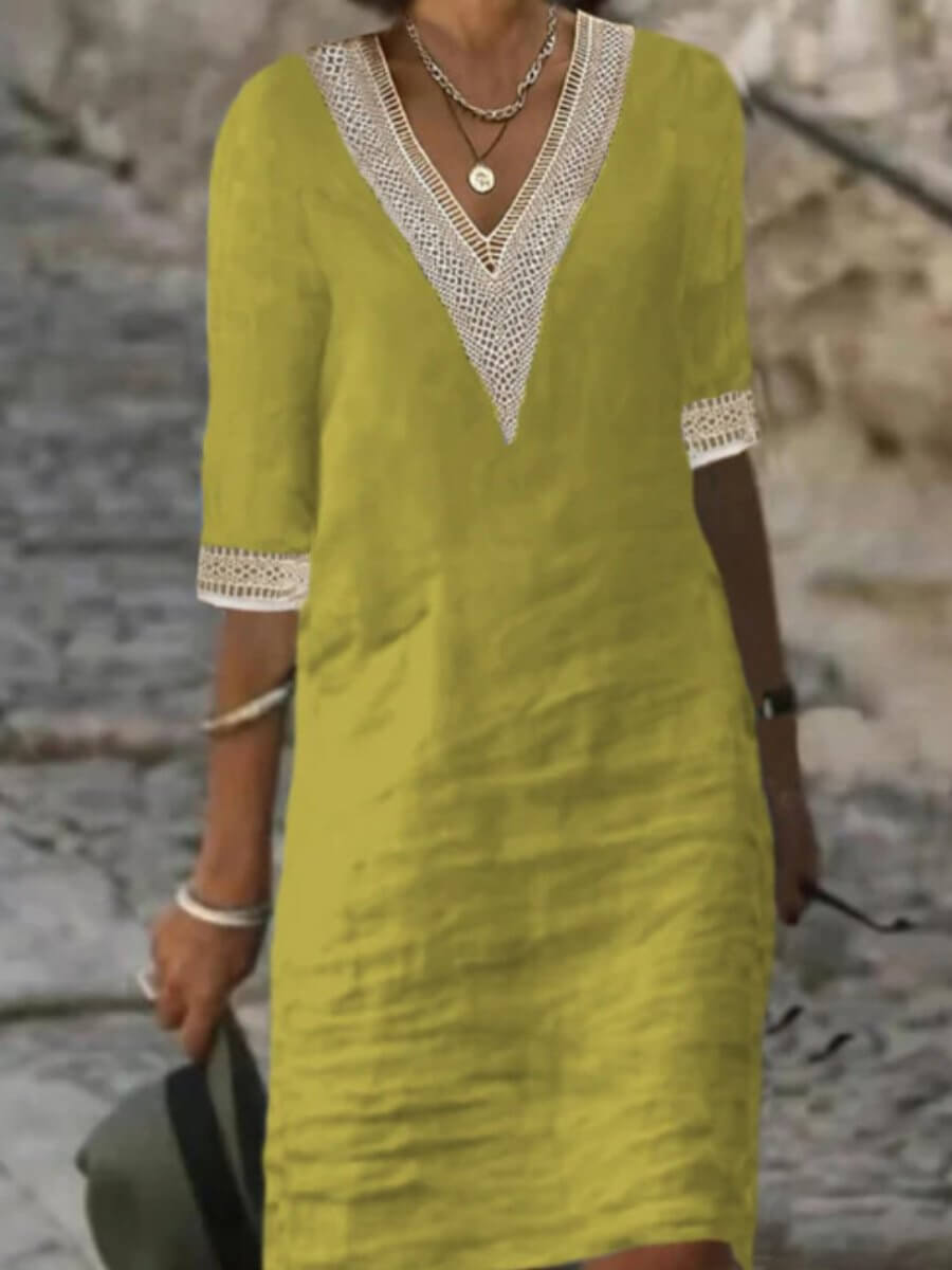 Stylish women's V-neck casual midi dress with a relaxed fit for summer comfort.
