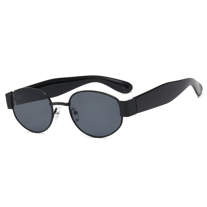 Elegant women's fashion sunglasses. Cat-eye design, UV protection, sleek metal frame eyewear for style.