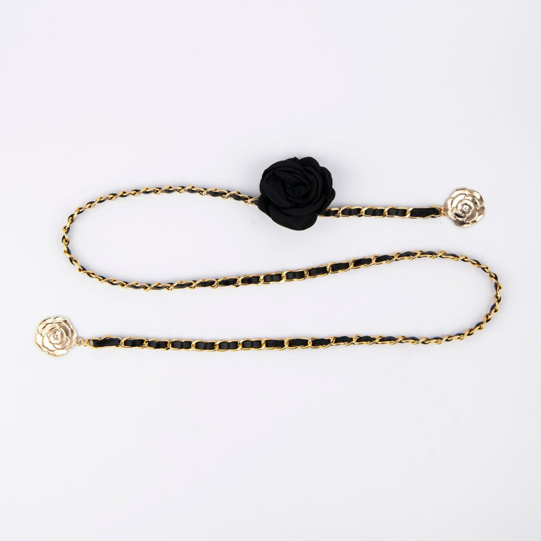 Statement women's fashion chain belt with elegant rose details, a chic accessory to elevate any outfit.