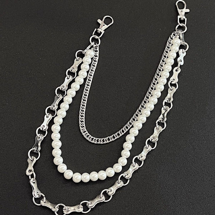Delicate women's fashion chain bracelet adorned with lustrous pearls, an elegant and versatile jewelry piece.
