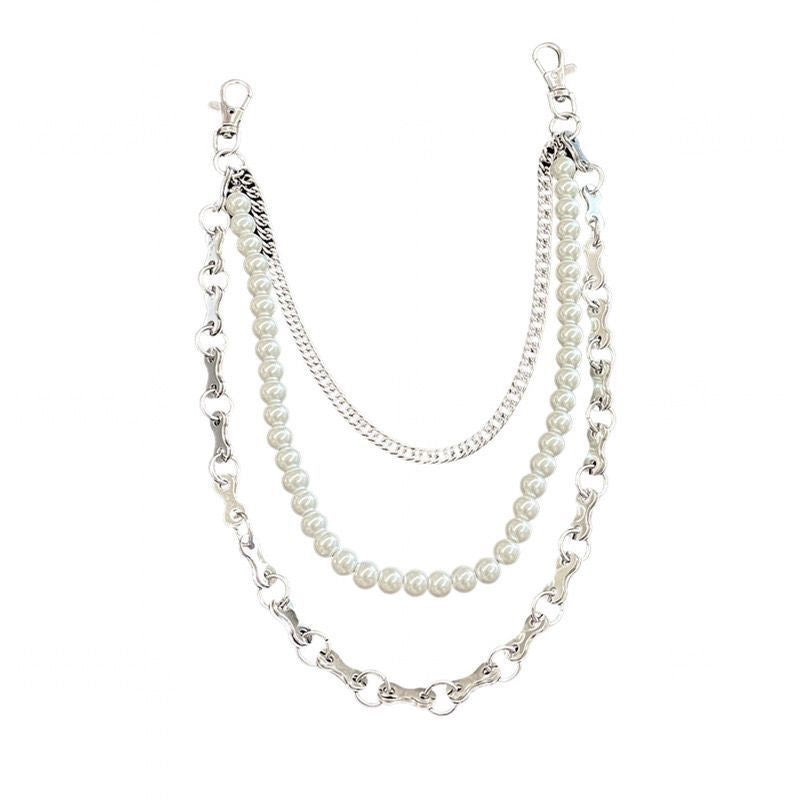 Lustrous pearl and chain bracelet for women, an elegant and adjustable fashion jewelry statement piece.