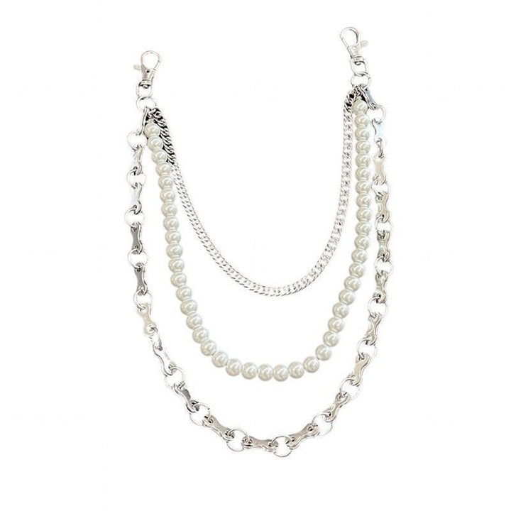 Lustrous pearl and chain bracelet for women, an elegant and adjustable fashion jewelry statement piece.