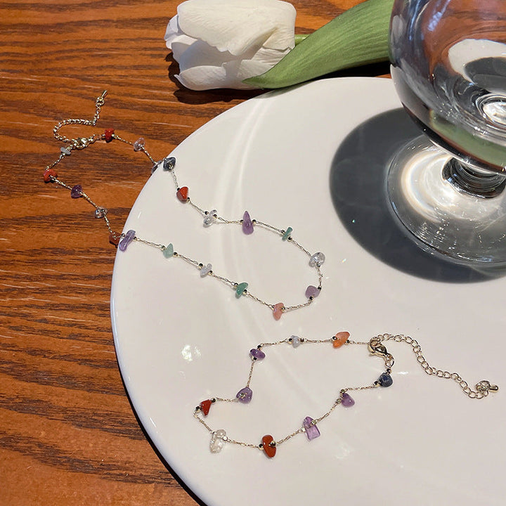 Women's elegant fashion bracelet featuring multiple colorful gemstone charms, a stunning accessory.
