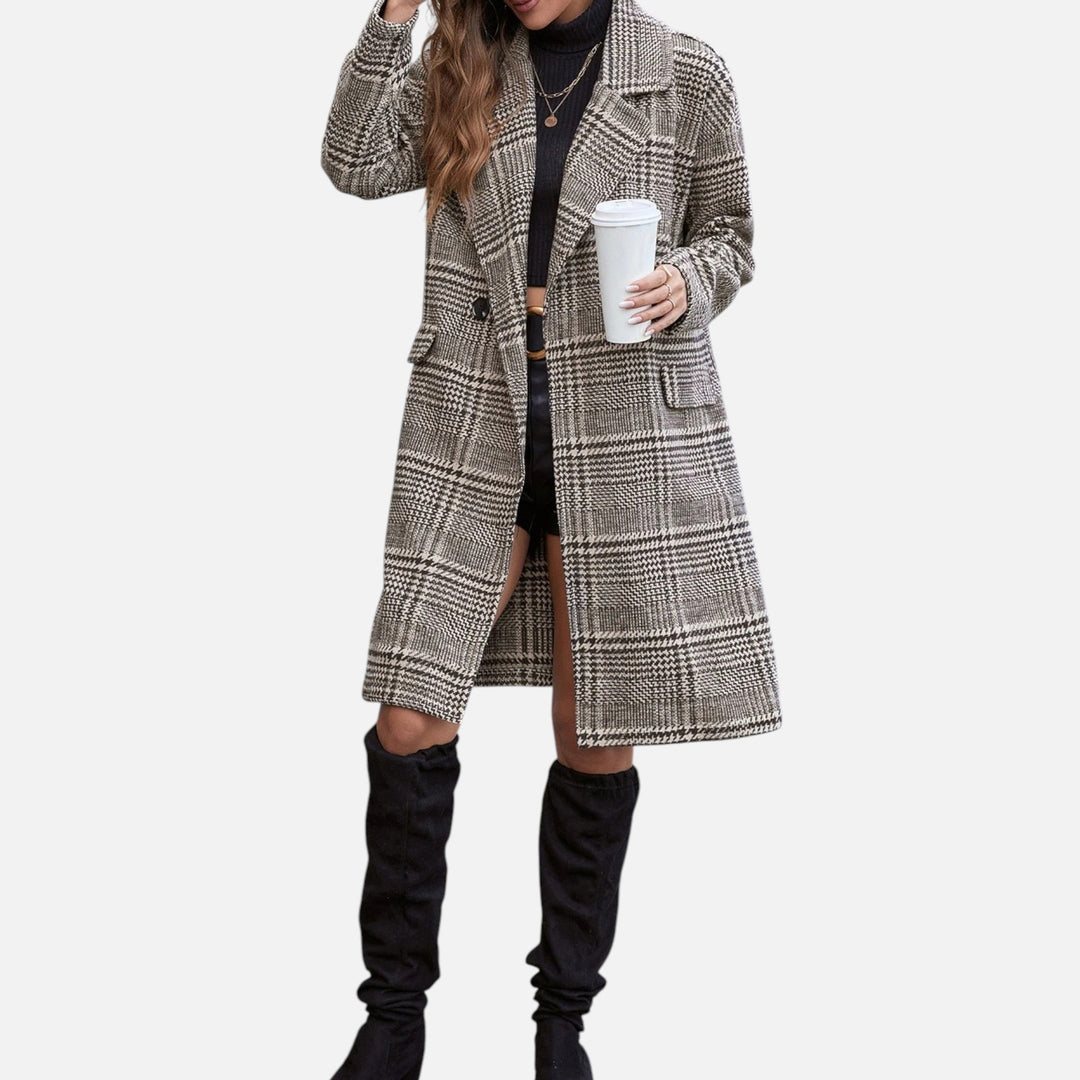 Chic women's checkered blazer jacket. Tailored fit for sophisticated professional wear and elegant occasions.