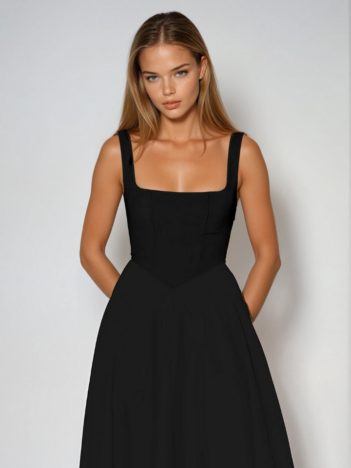 Sophisticated women's midi dress, perfect as a chic wedding guest outfit or elegant cocktail dress.