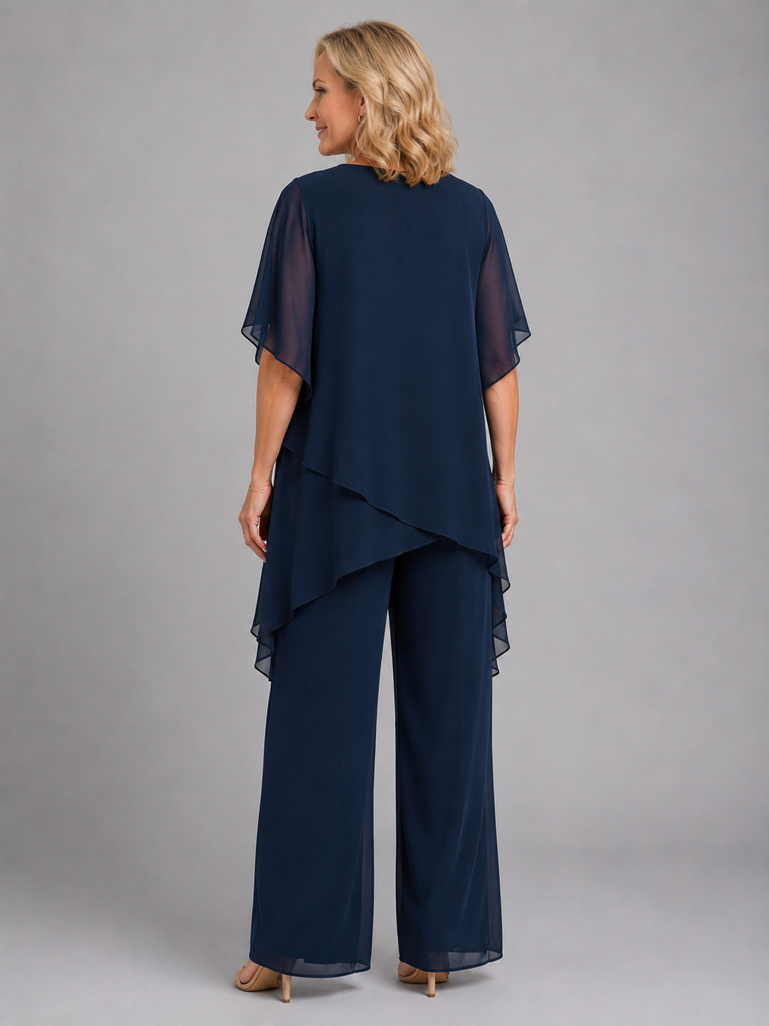 Stylish women's matching chiffon wide-leg two-piece set, versatile for elegant events or casual summer days.