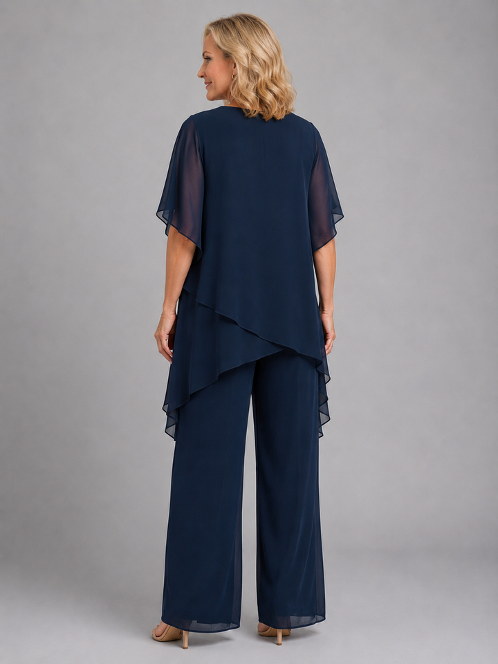 Stylish women's matching chiffon wide-leg two-piece set, versatile for elegant events or casual summer days.