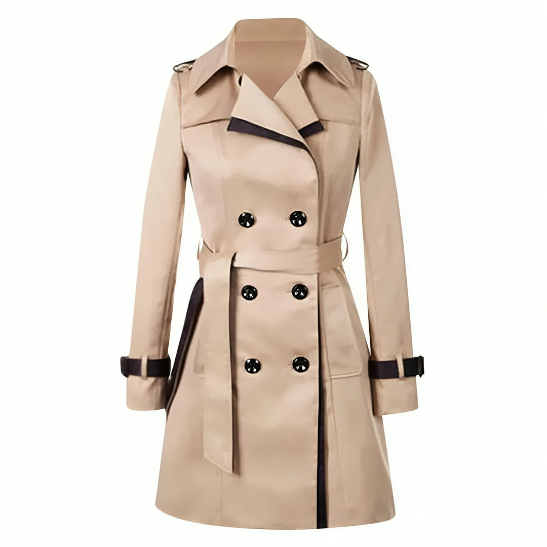 Fashionable women's double-breasted trench coat. Classic mid-length outerwear, belted for a flattering fit.